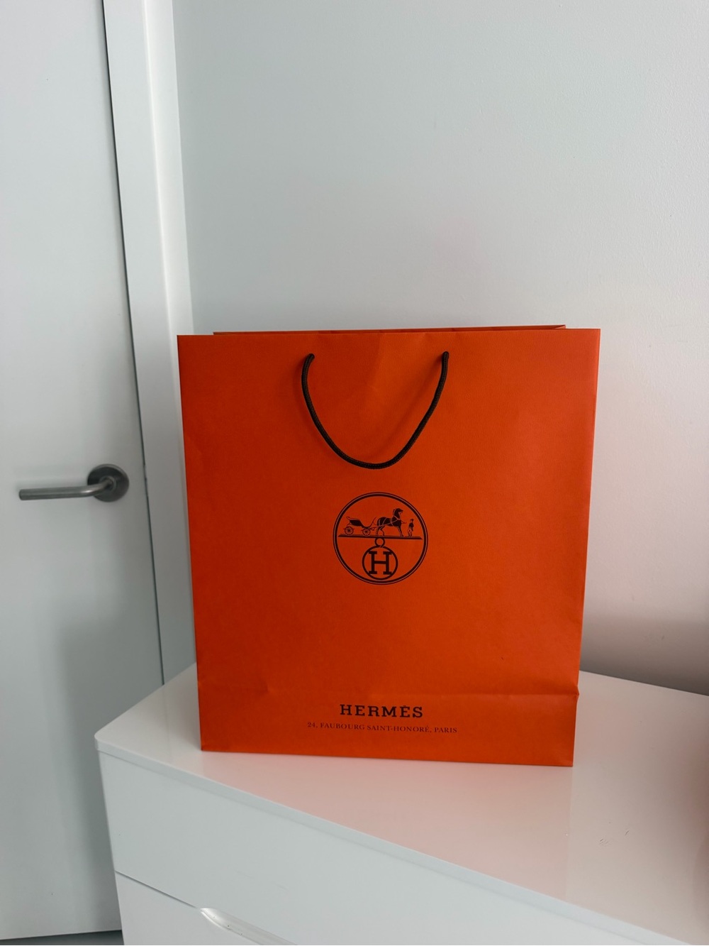 Hermes Orange Shopping Bag with Black Rope Handles